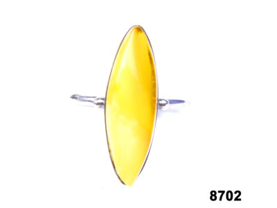Front view of Russian hallmarked silver ring with egg yolk amber from Antiques of Kingston
