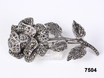 Front view of Vintage silver marcasite rose brooch with a brass fastener pin from Antiques of Kingston