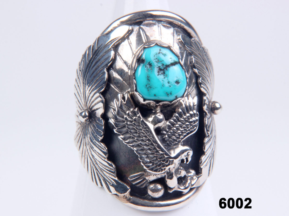 Front view of Navajo sterling silver ring with turquoise & eagle from Antiques of Kingston