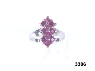 Front view of  925 Sterling silver ring set with 10 rubies from Antiques of kingston
