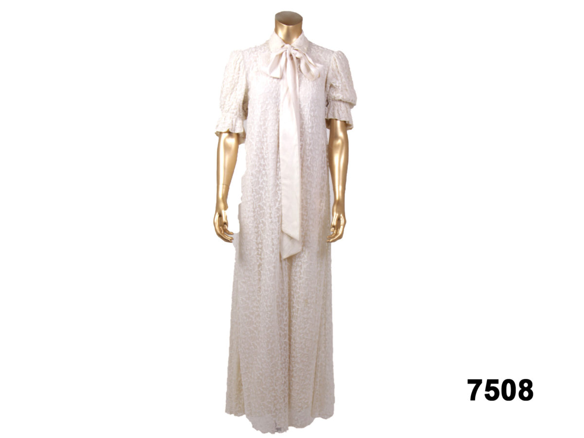 Front view of Vintage cream lace gown from Antiques of Kingston