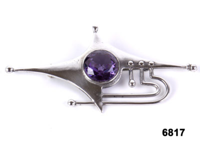 Front view of 925 Sterling silver brooch with a large amethyst in a modernist style from Antiques of Kingston
