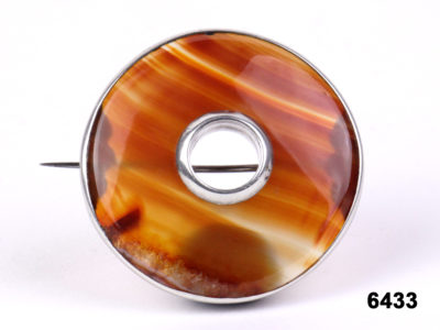 Front view of Victorian Scottish agate brooch on a silver setting from Antiques of Kingston