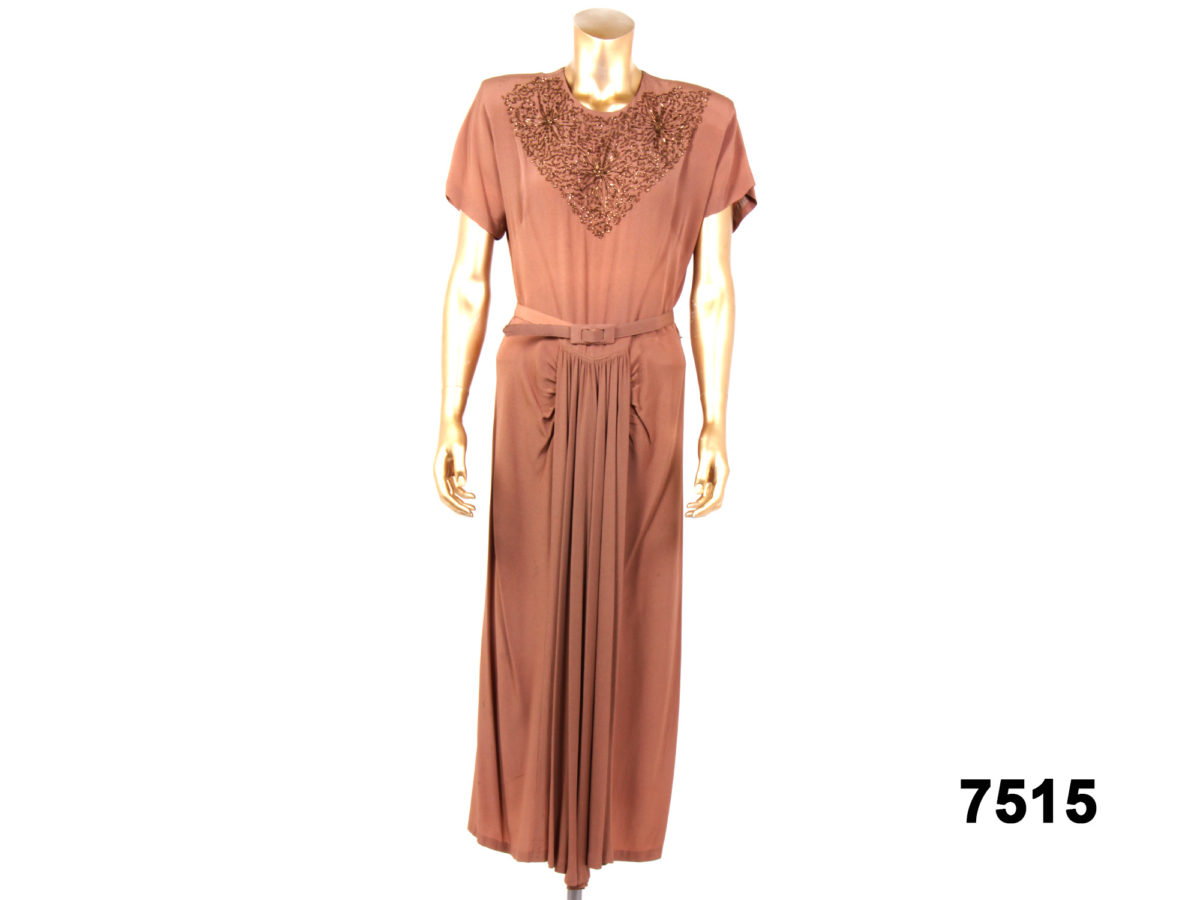 Front view of 30s Crepe de Chine copper coloured dress with beading on the bodice from Antiques of Kingston.