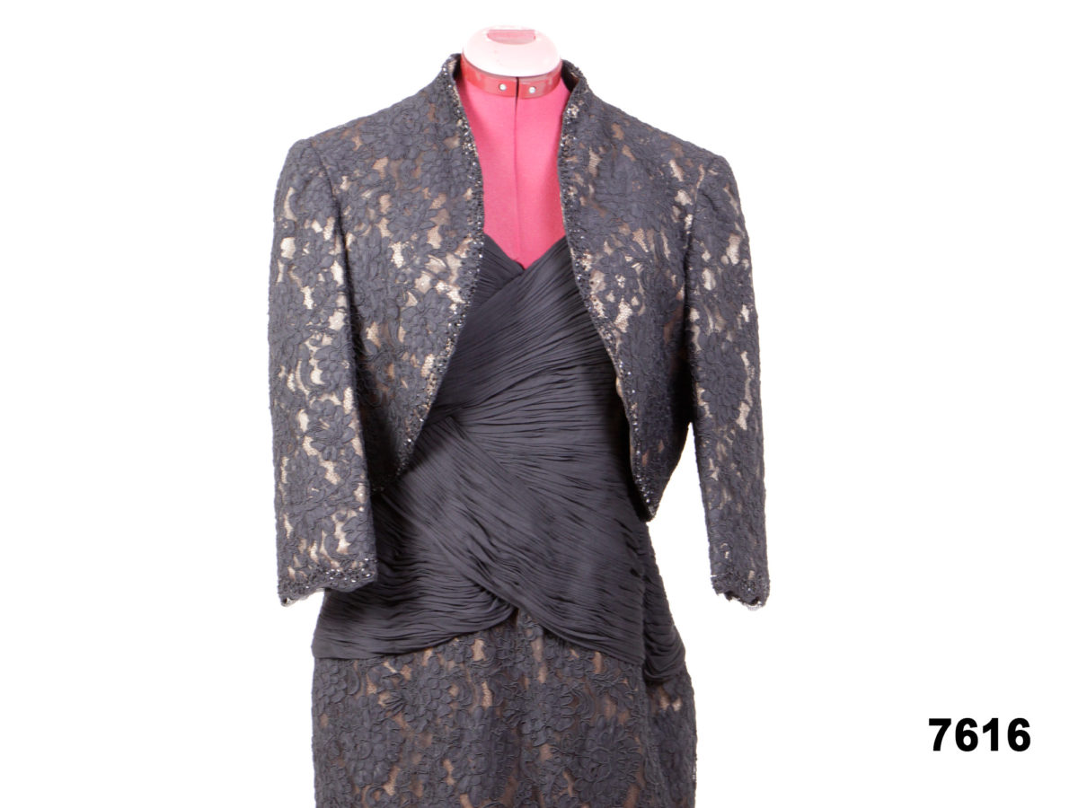 Front view of Jovani black lace and bead dress with matching jacket from Antiques of Kingston