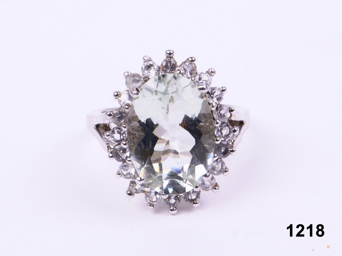 925 Sterling silver ring with a large oval cut pale blue topaz encircled by cubic zirconia from Antiques of Kingston