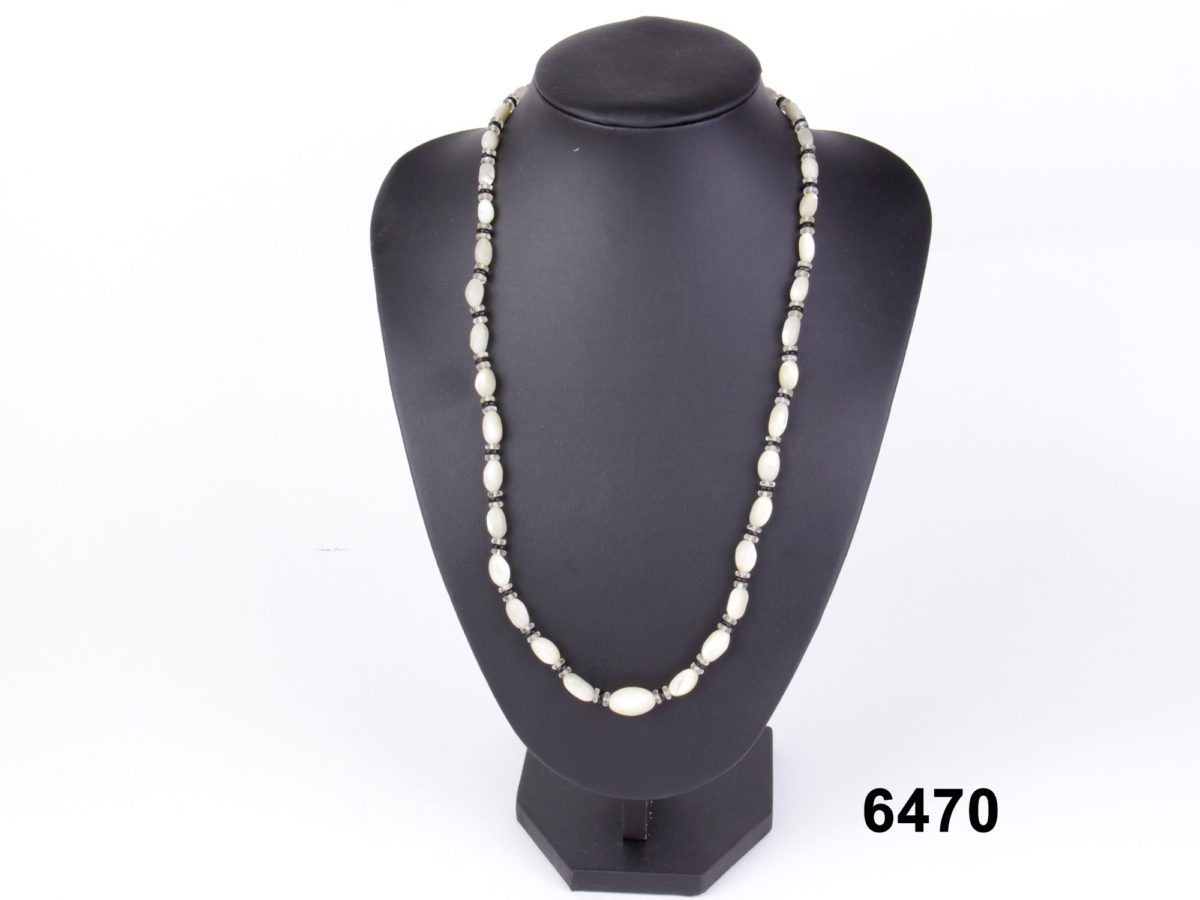 Art Deco mother-of-pearl necklace with pearl glass faceted spacers from Antiques of Kingston