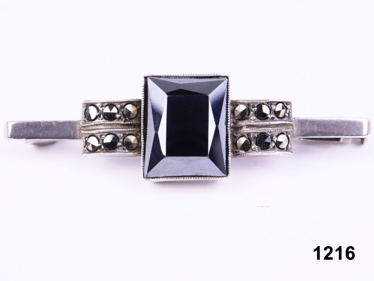 Front view of c1930s sterling silver bar brooch with black onyx stone and marcasite from Antiques of Kingston