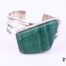 Front view of 925 Taxco Mexican sterling silver bangle with a large malachite from Antiques of Kingston.