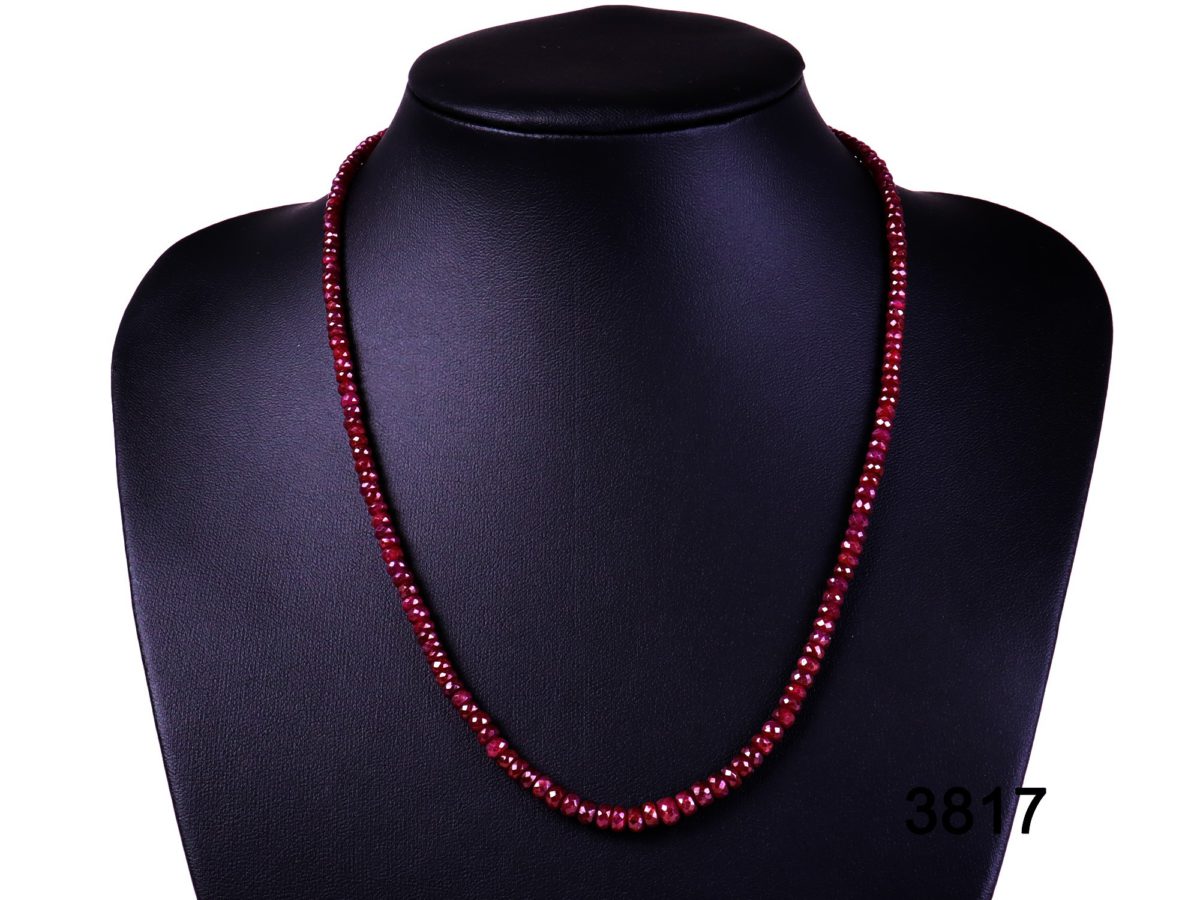 Faceted ruby bead necklace with 18 carat gold clasp from Antiques of Kingston