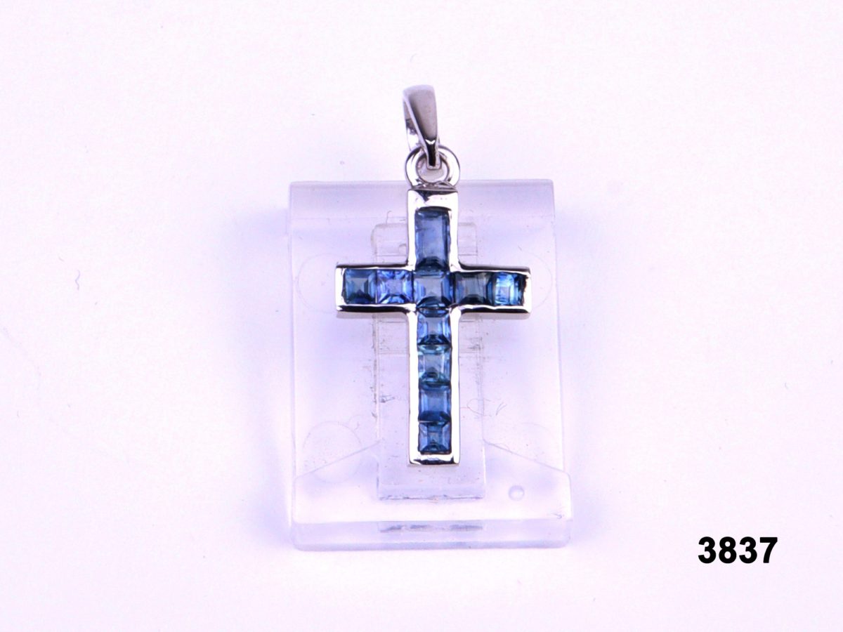 Front view of 18 karat White gold and sapphire cross pendant from Antiques of Kingston