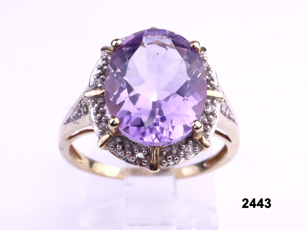 9 carat gold ring with oval cut lilac amethyst and diamonds from Antiques of Kingston