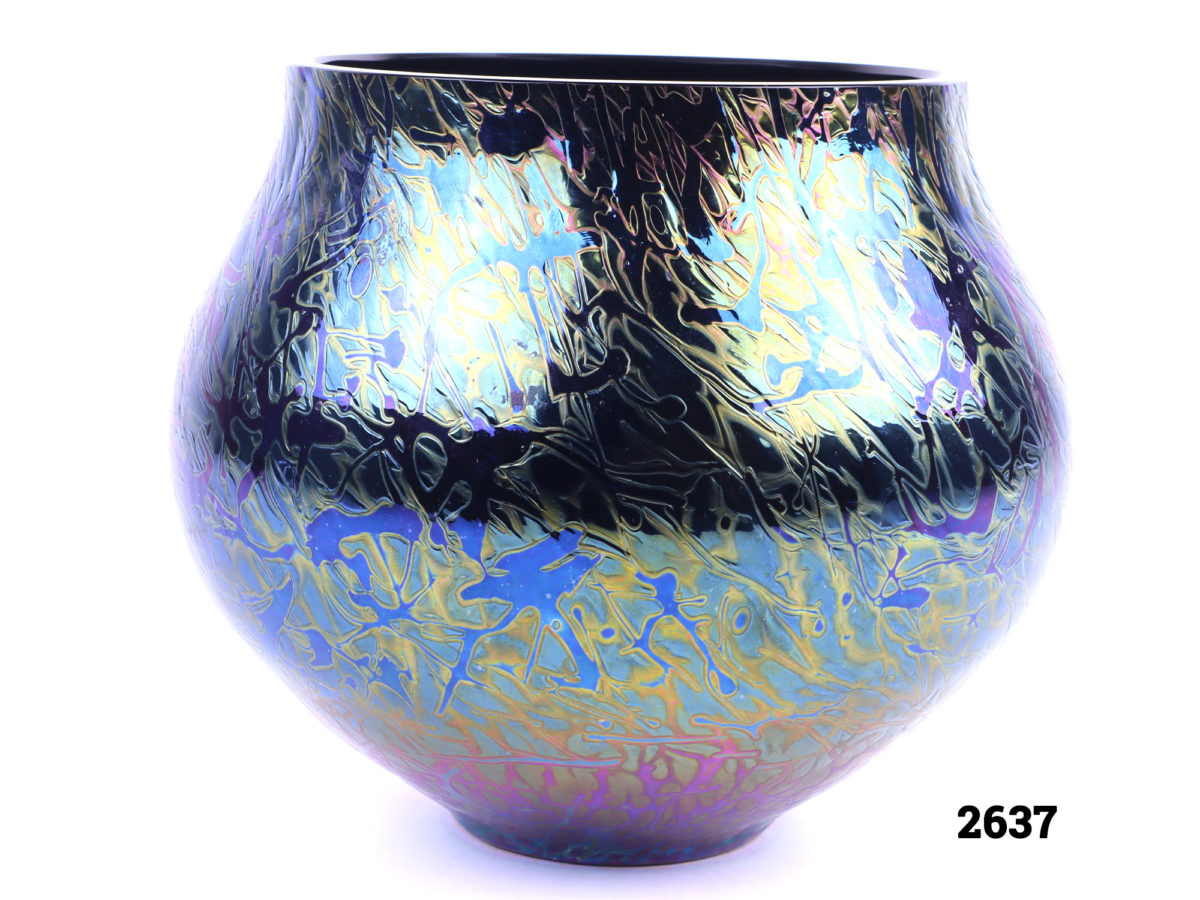 Royal Brierley bulbous vase in iridescent peacock blue, purple and golden yellow glass Measures 55mm in diameter at base and 110mm at top Main photo showing side view of the vase