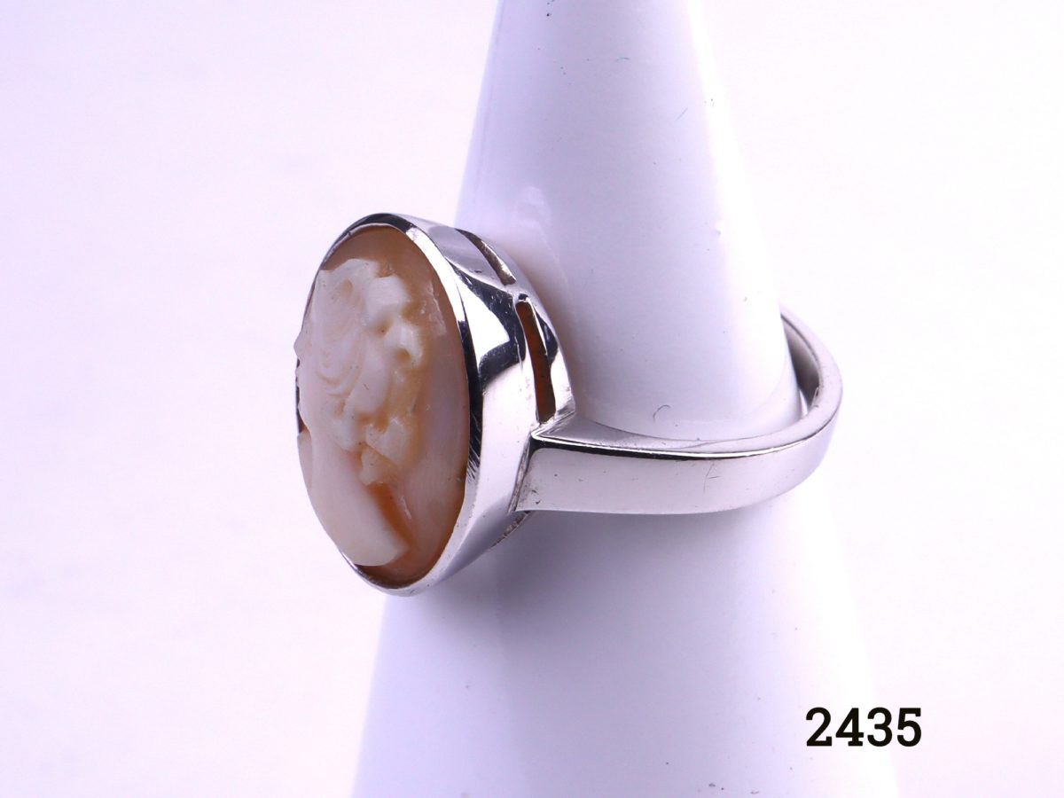 925 Sterling silver cameo ring Ring size N / 6.5 Cameo measures 20mm by 15mm Photo of side angle of ring on display stand