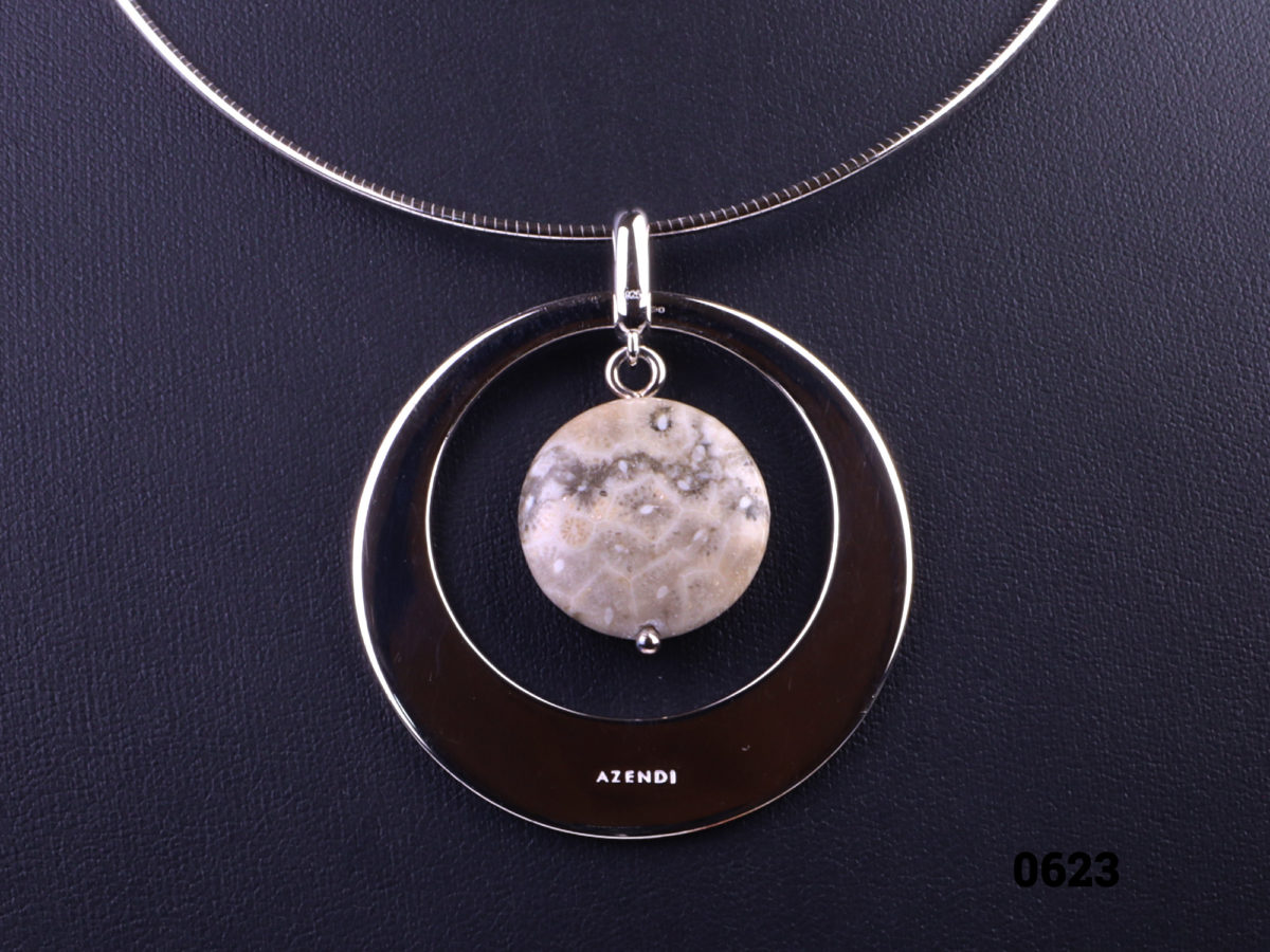 Sterling silver snake chain necklace with a jasper stone pendant set in sterling silver circle frame