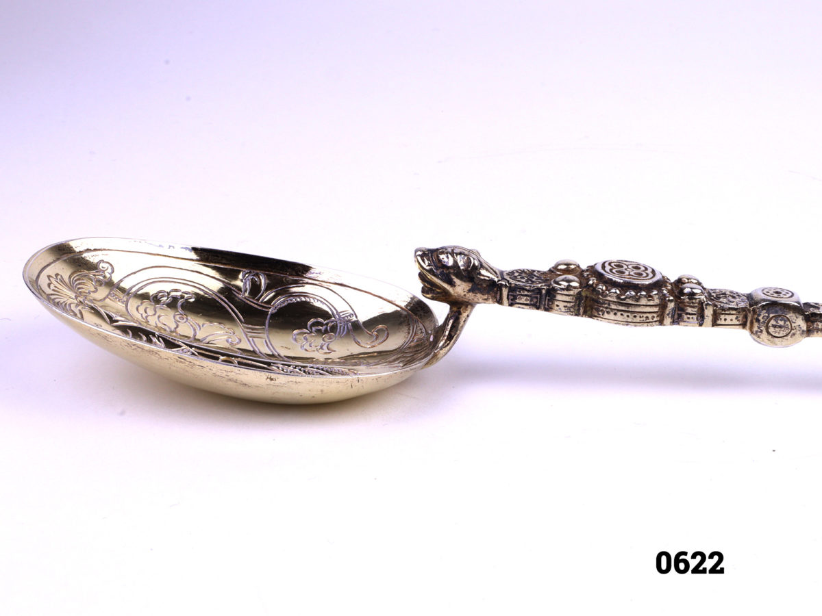 Large silver anointing spoon c1910 Birmingham assayed sterling silver with gilt bowl by Elkington & Co Close up photo of the spoon bowl from the side