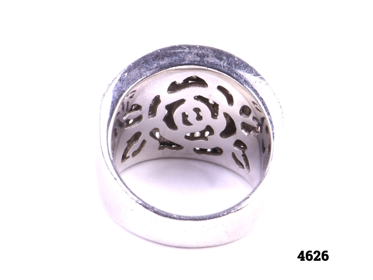 925 Sterling silver ring with alternating layers of round and baguette cut cubic zirconia stones Back view