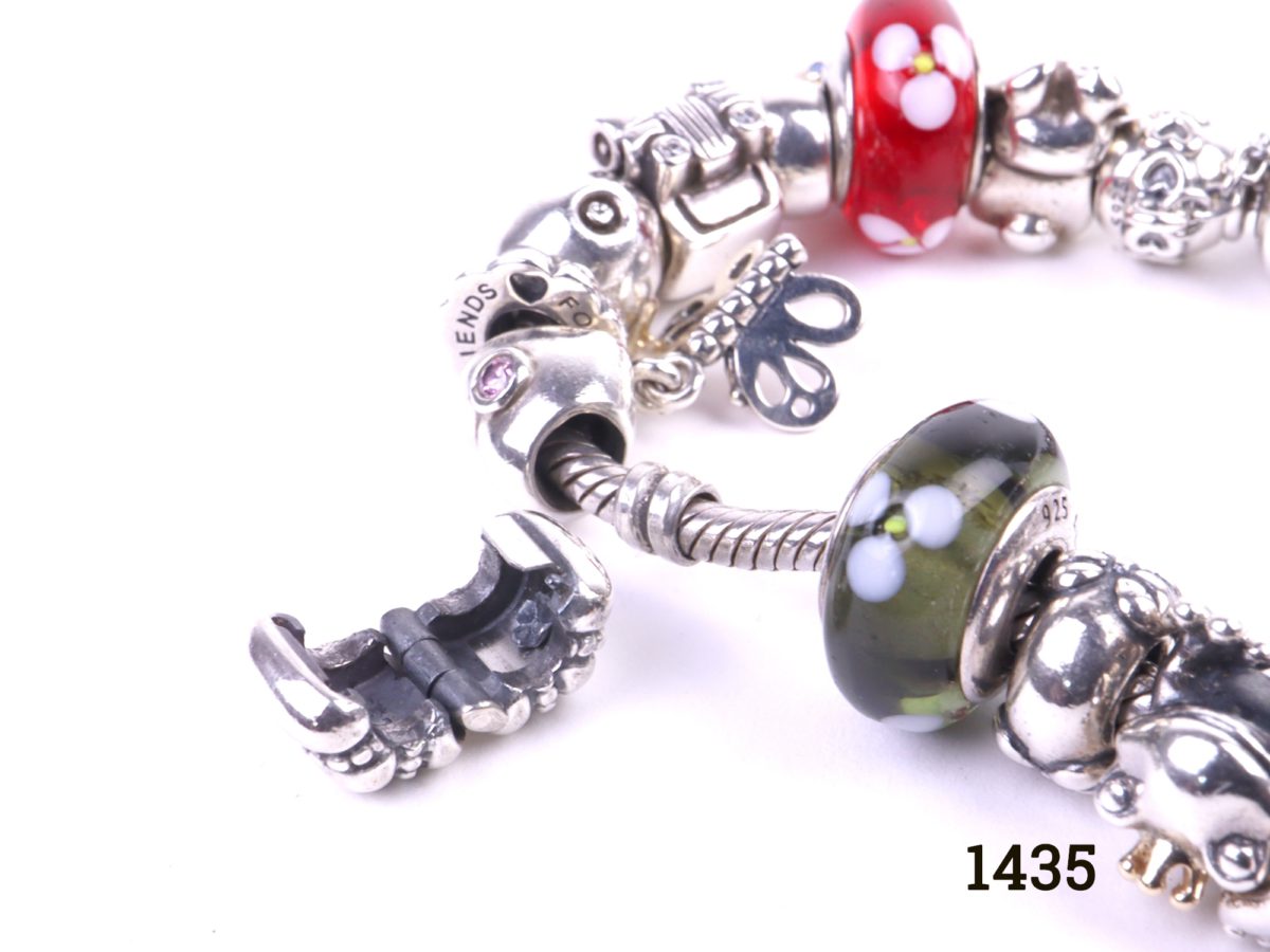 Pandora silver bracelet fully loaded with 22 charms Photo showing close up of some charms