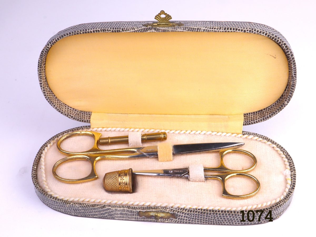 Vintage Cased Sewing Set Image looking into open case from above