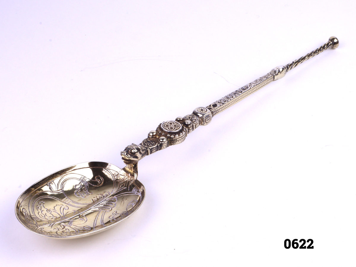 Large silver anointing spoon c1910 Birmingham assayed sterling silver large anointing spoon with gilt bowl by Elkington & Co Close up photo of spoon in its entirety