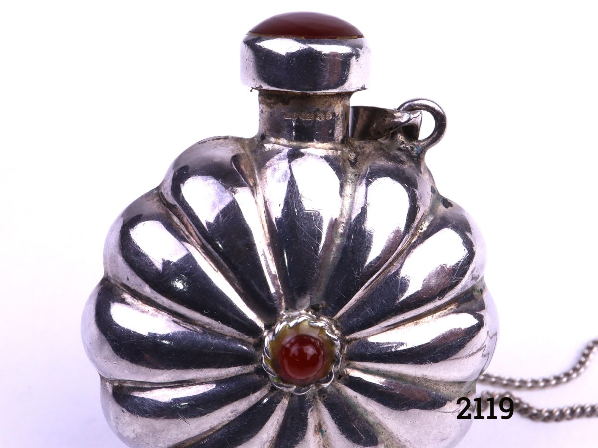 Silver scent bottle pendant on chain with carnelian stone accent Photo showing close up of scent bottle with hallmark below the applicator lid