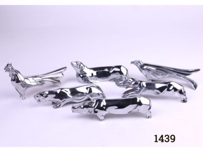 Set of six Art Deco French chrome novelty animal knife rests (1 each of Eagle, Rhino, Elephant, Seal, Rooster & Jaguar) Each measures 90mm to 100mm in length and approximately 20mm in width Main photo of all 6 knife rests