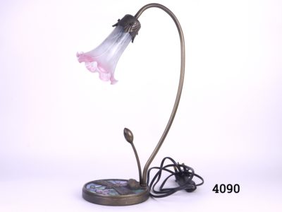 Tiffany style table lamp with a lily flower shaped glass shade and dragonfly on pond detail at the base PAT tested Main photo showing lamp in its entirety from a side abgle