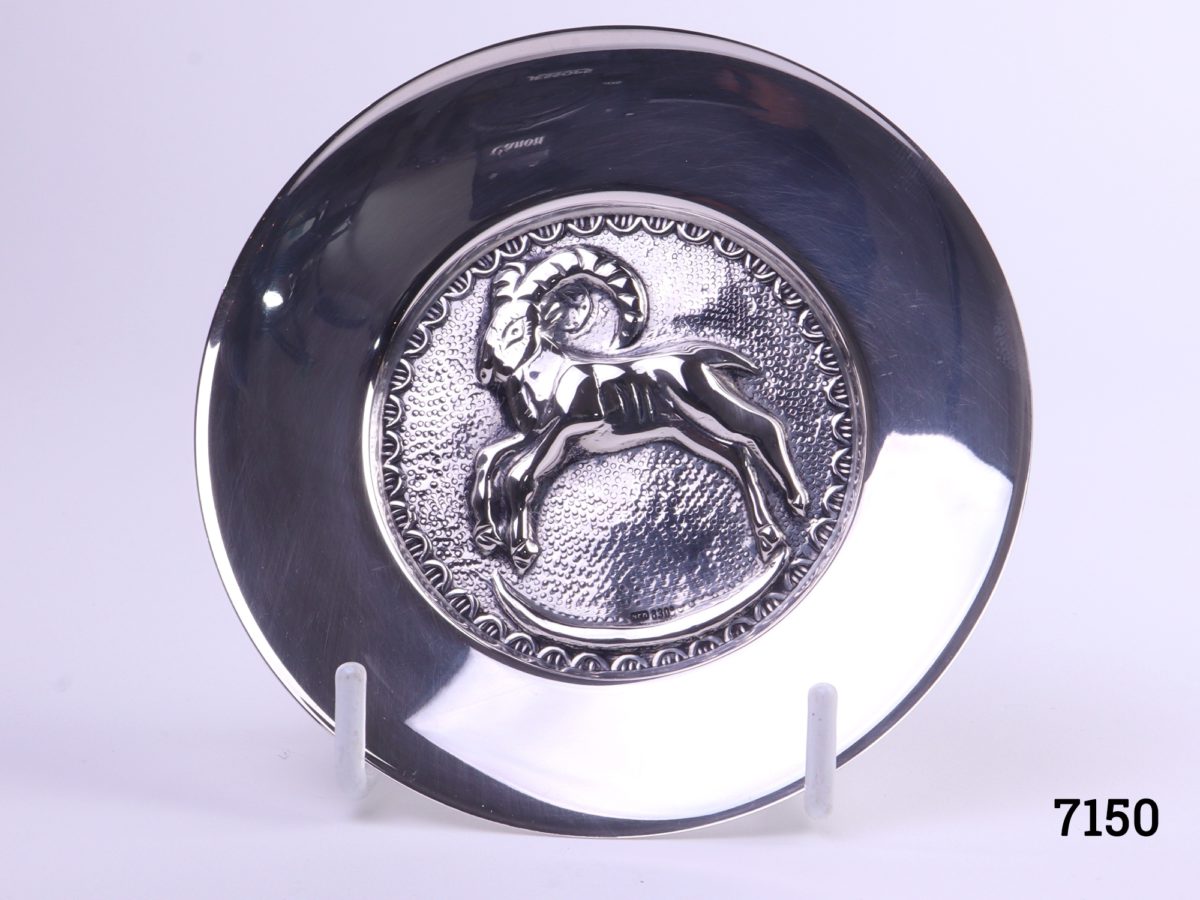 Danish silver pin dish with a figure of a ram to the centre Hallmarked Nrn 830 Measures 97mm in diameter Main photo showing front of dish on display stand