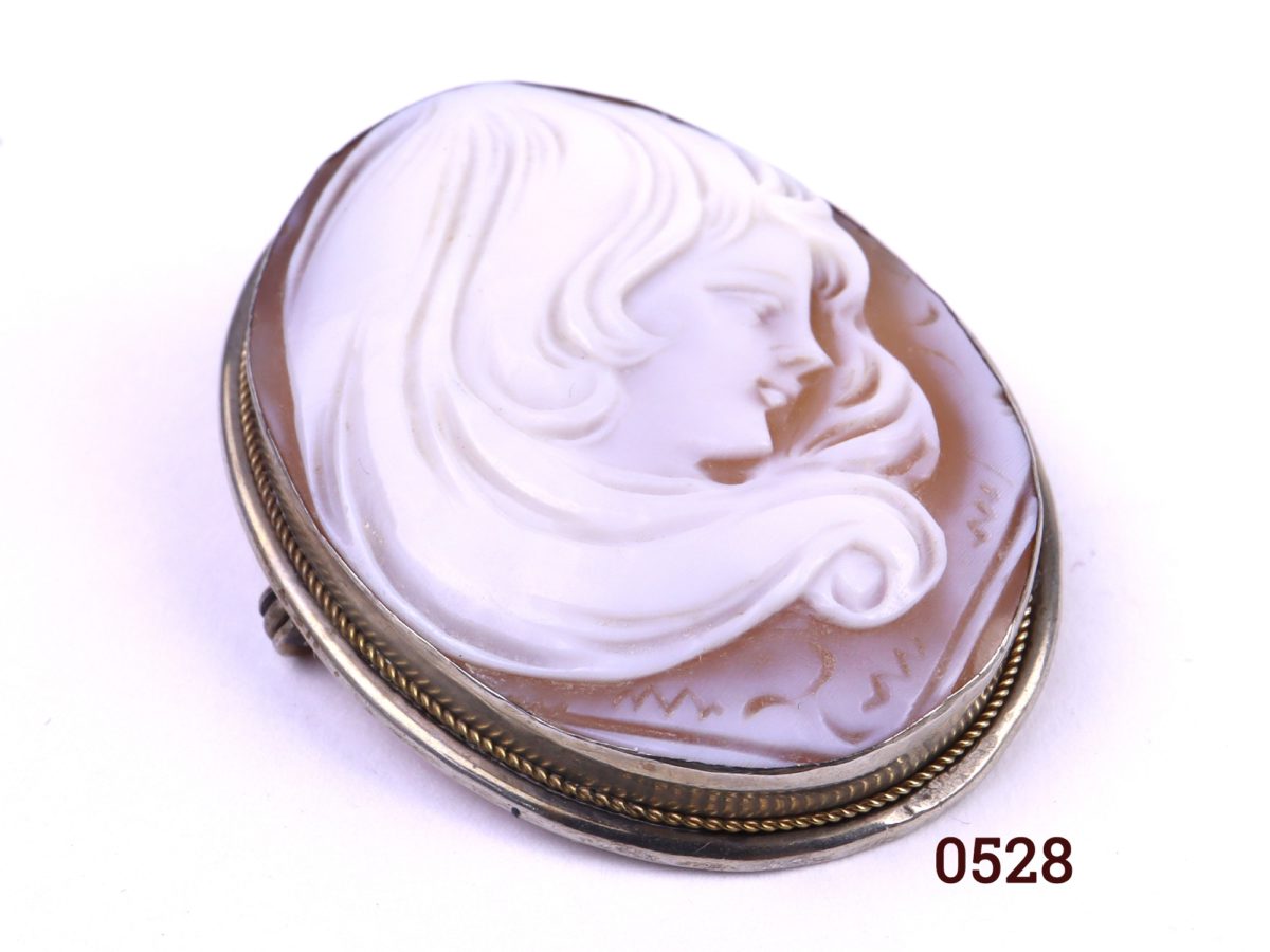 Continental silver cameo brooch which can also be worn as a pendant Hallmarked 800 for continental grade silver Photo showing front of brooch from a slight side angle