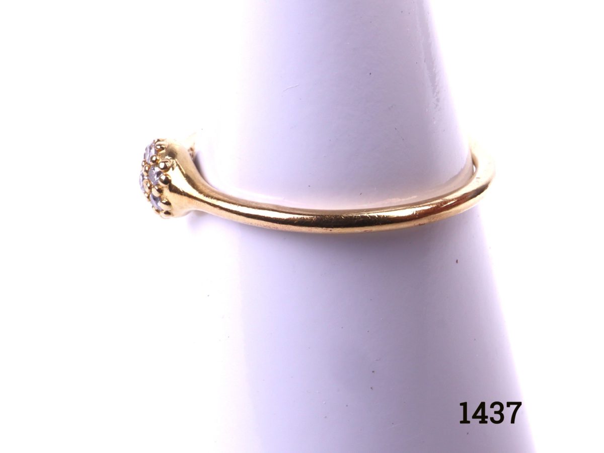 18ct yellow gold Pandora love pod stacking ring with seven round cut diamonds Size N / 6.5 Photo showing side view of ring on display stand