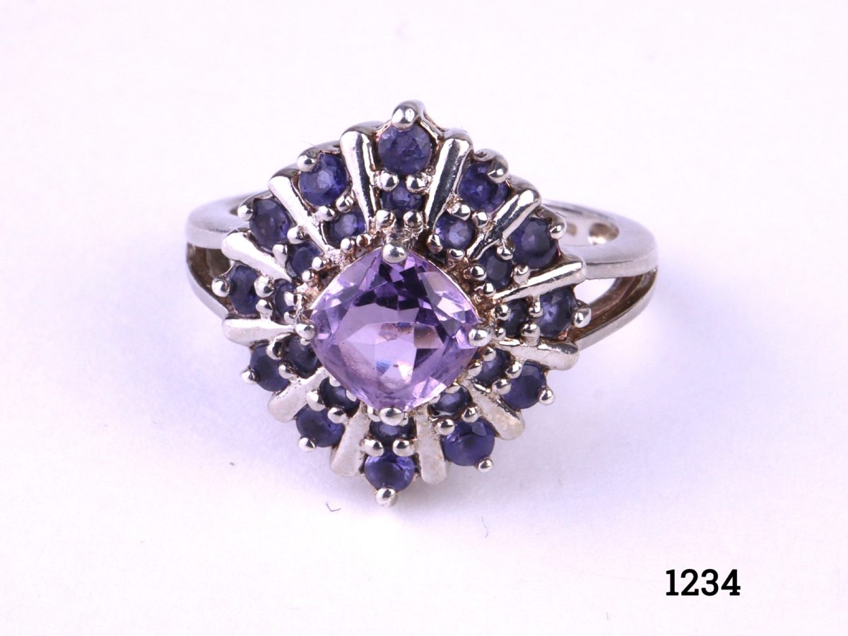 925 Sterling silver ring with princess cut amethyst stone to the centre surrounded by 12 small round lazulite stones Size N / 6.75 Close up view of the front of ring