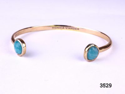 Monica Vinader thin cuff bracelet in 18ct rose gold vermeil on 925 sterling silver with two mutifaceted amazonite stones at both ends (Stones are a sky blue shade with thin wisps of white) Main photo showing front of bracelet with amazonite stones at either end
