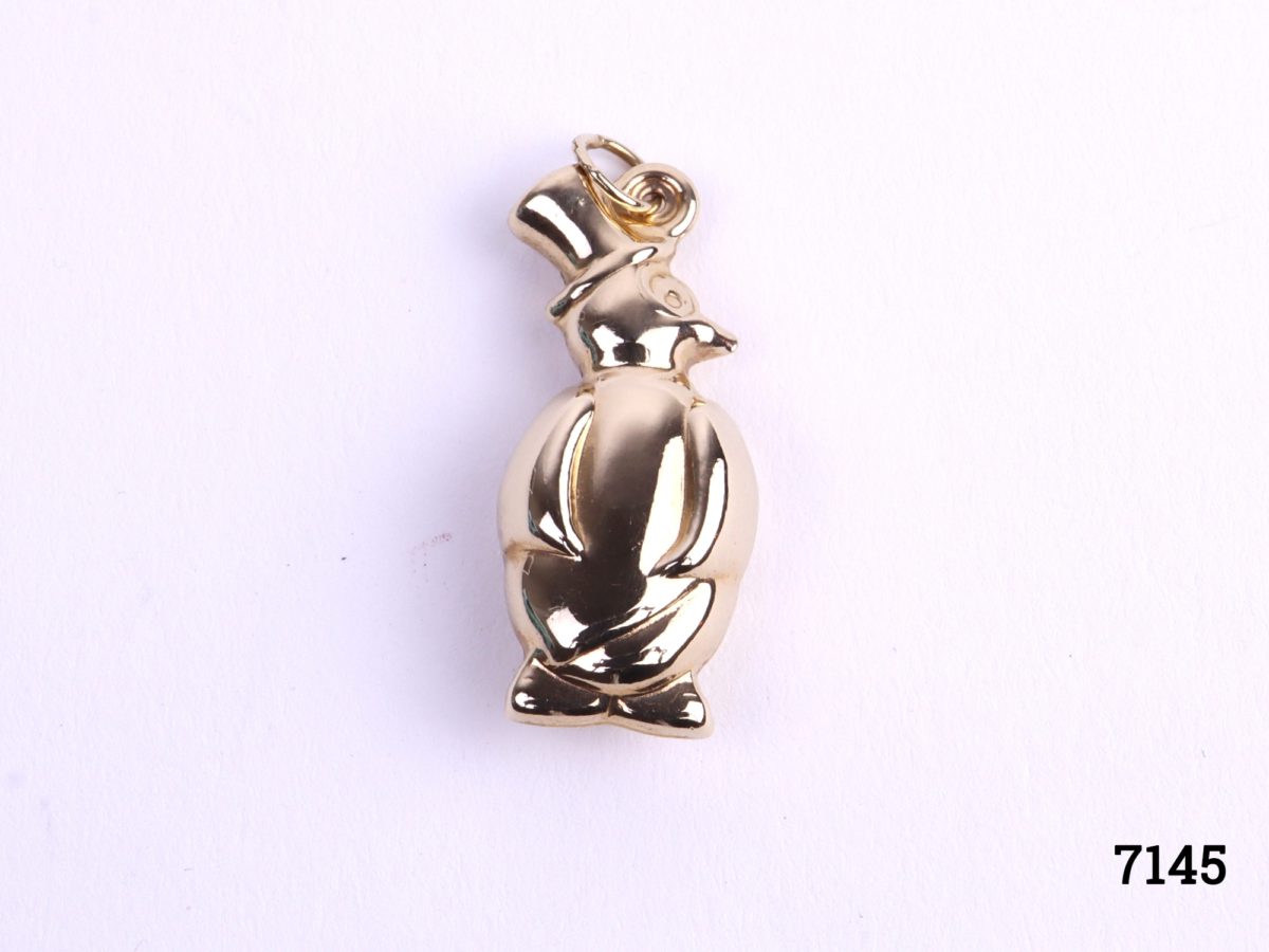 c1991 Sheffield assayed 9carat gold penguin charm with black enamel bow tie Fully hallmarked with goldsmiths initials LJ Photo of rear of pendant (no black tie)