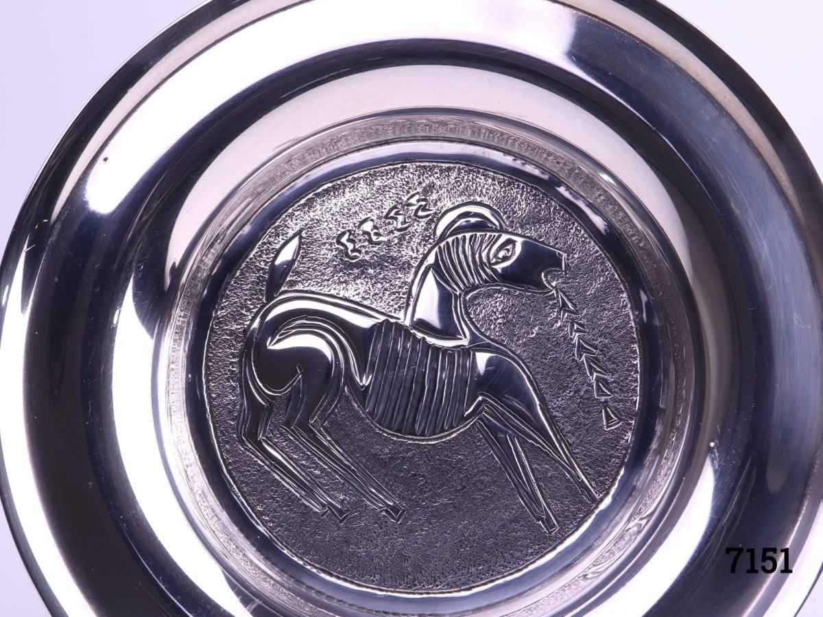 Continental 830 silver pin dish with figure of a mythological creature with horn to the centre Hallmarked GS 830 (Probable Cyprus assay) Measures 104mm in diameter Close up photo of the mystical creature