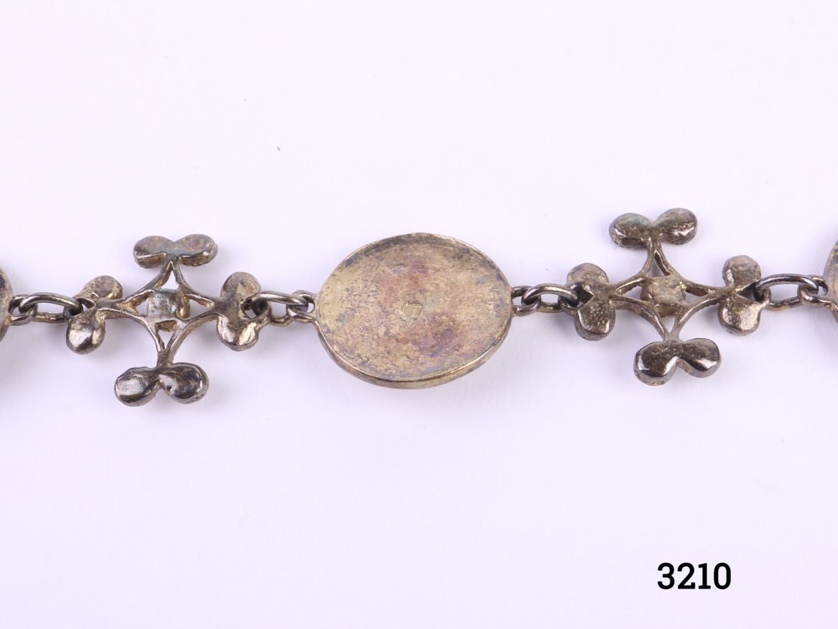Gilt sterling silver 7th Century BC copy of bracelet using design combinations of gold plaques & gold ear pendant found at Camirus, Rhodes and dress-ornaments from Ephesus excavations. Close up of back of one of the panels