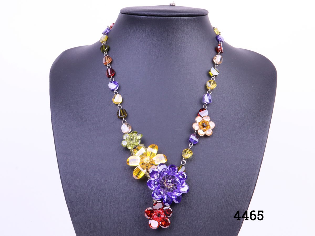 Colourful Butler and Wilson necklace with multi-coloured crystal flowers and beads Comes in original box Length adjustable from 420mm to 500mm Main photo showing necklace displayed on stand