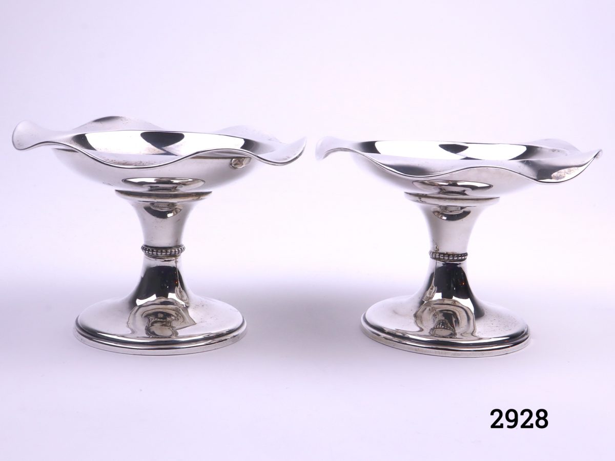 Pair of small silver tazzas Fully hallmarked for sterling silver c1908 Birmingham assayed Each measures 58mm in diameter at base and 95mm across the top Main photo showing both tazzas side by side