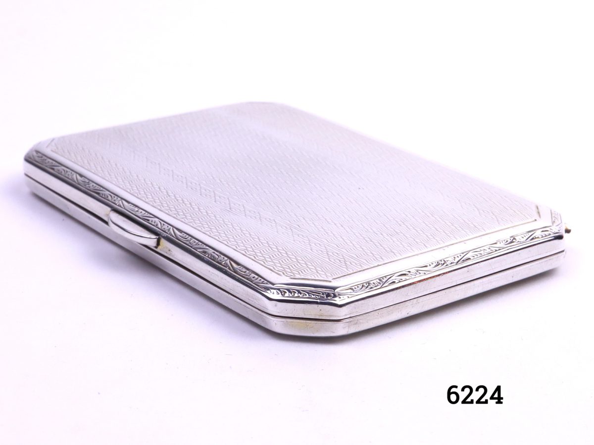 Small silver cigarette case with engine turned design on both sides Made by Turner & Simpson of Birmingham c1930/31 Photo of case from a slight side angle
