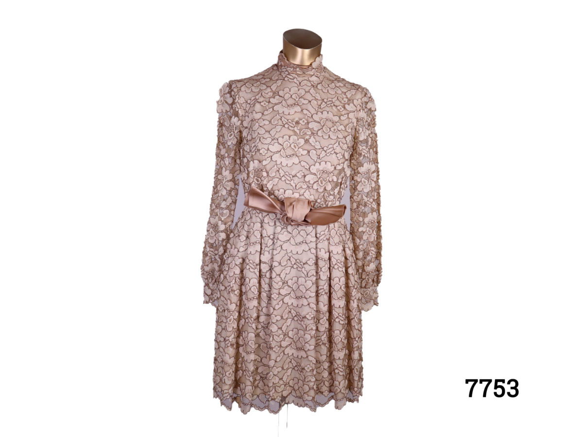 1960s Lace dress in shades of coffee cream Fully lined (Very small opening to get hand through the arm only 75mm across !) Size 6 or small size 8 Main photo of front of dress displayed on a mannequin