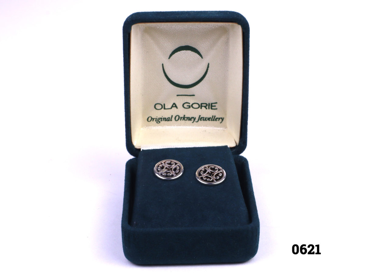 Ola Gorie silver stud earrings. Made in the Orkney Islands. Butterfly back fastening. Comes in original Ola Gorie box. Stud front measures 10mm in diameter. Weight 1.3g Photo of earrings displayed in the original box