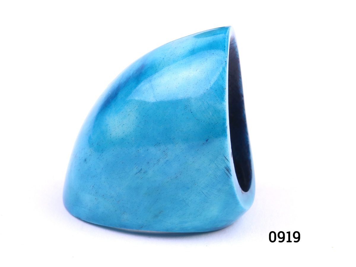 Turquoise tagua nut ring. Turquoise blue sky dyed tagua nut (vegetable ivory) statement ring. Measures 40mm by 26mm at front Size R / 8¾ Photo showing ring from a side angle