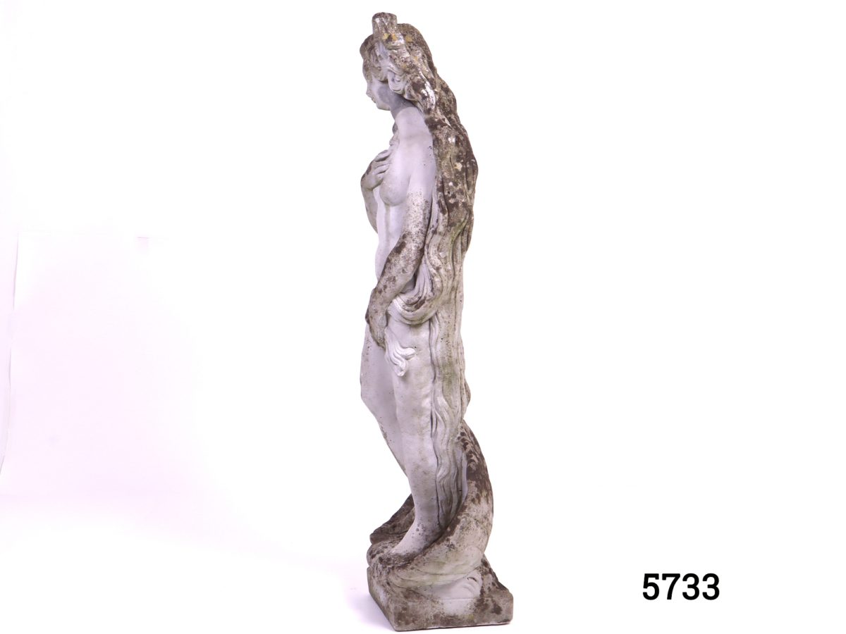 Well weathered concrete garden statue fashioned in the form of Sandro Botticellis Birth Of Venus. Square base measures 175mm by 165mm Side view of the statue