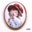 Vintage pinchbeck set brooch. Victorian ceramic brooch in a pinchbeck mount with a hand-painted image of a lady in the style of Thomas Gainsborough Main photo of front image of brooch