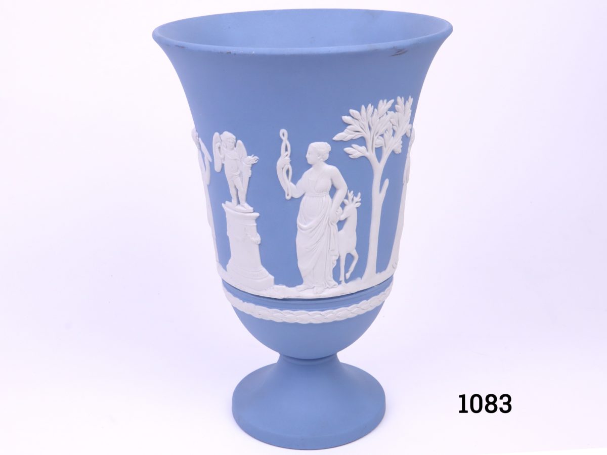Vintage Wedgwood Jasperware vase in the classic light blue c1975 Measures 76mm in diameter at base and 130mm in diameter across the top Main photo of vase looking straight on