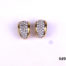 Vintage Swarovski clip-on earrings in gilt metal encrusted with Swarovski crystals Measures 20mm by 10mm Both clips in good order Main photo of earrings displayed on a flat surface showing crystals