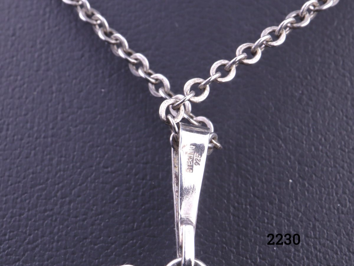 925 Sterling silver Modernist style pendant on silver chain Pendant measures 33mm by 30mm Close up photo of the hallmark on the pendant bail