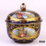 Antique Meissen small lidded bowl in royal blue with gilt throughout and decorated with intricate hand-painted images of courting couples. Rose bud to top of lid intact with minor chips at the edges and some gilt wear. Measures 45mm ín diameter at base and 80mm across the top.                               Base of lid measures 86mm Main photo of pot with lid in place showing 2 of the courting couple scenes