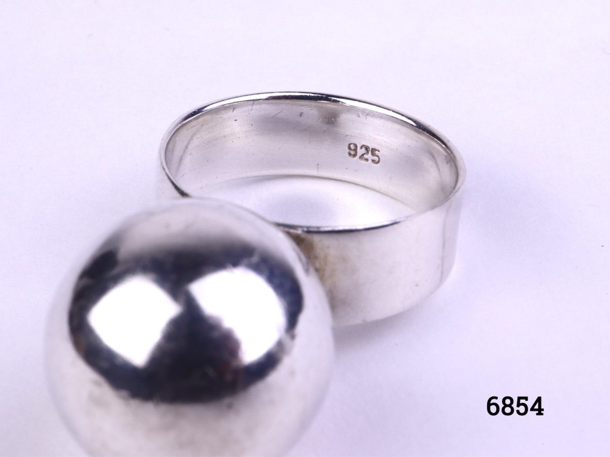 Modernist sterling silver ring with large silver ball Hallmarked 925 for sterling silver Size L / 5.75 Close up photo showing the 925 hallmark