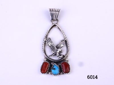 Vintage Navajo sterling silver eagle pendant with coral & turquoise stones. Signed and fully hallmarked on the back. Main photo showing whole front of pendant with eagle to the centre and three stones below 2 coral with turquoise stone in middle