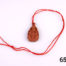 Vintage carved goldstone charm pendant of Guan Yin (The Buddhist Bodhisattva of compassion) Strung on customary red string Charm measures 32mm long by 20mm wide Main photo showing charm with whole length of red string